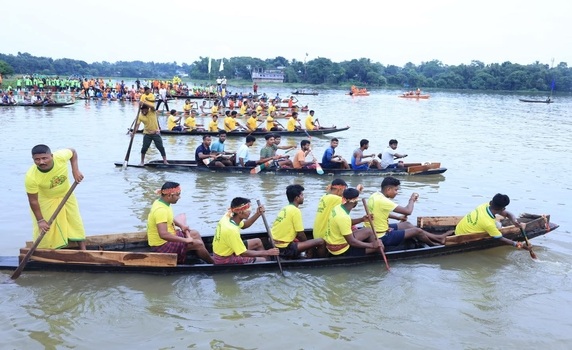 Moment of traditional Nouka Baich (boat race) on Rudrasagar Lake, Neermahal.